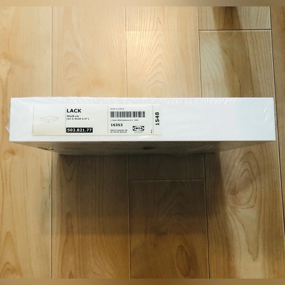 NWT. IKEA LACK white floating shelf design.
